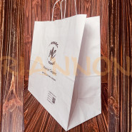  Bags with a twisted handle made of white craft paper